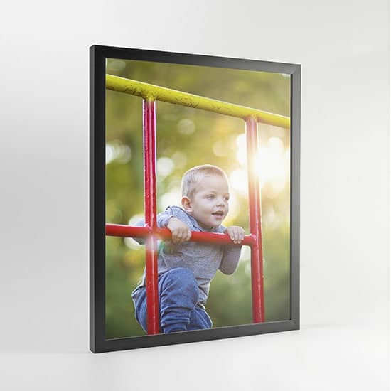 Black modern frame with child playing photograph