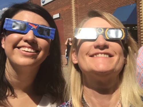 Circle Employees Watching Solar Eclipse