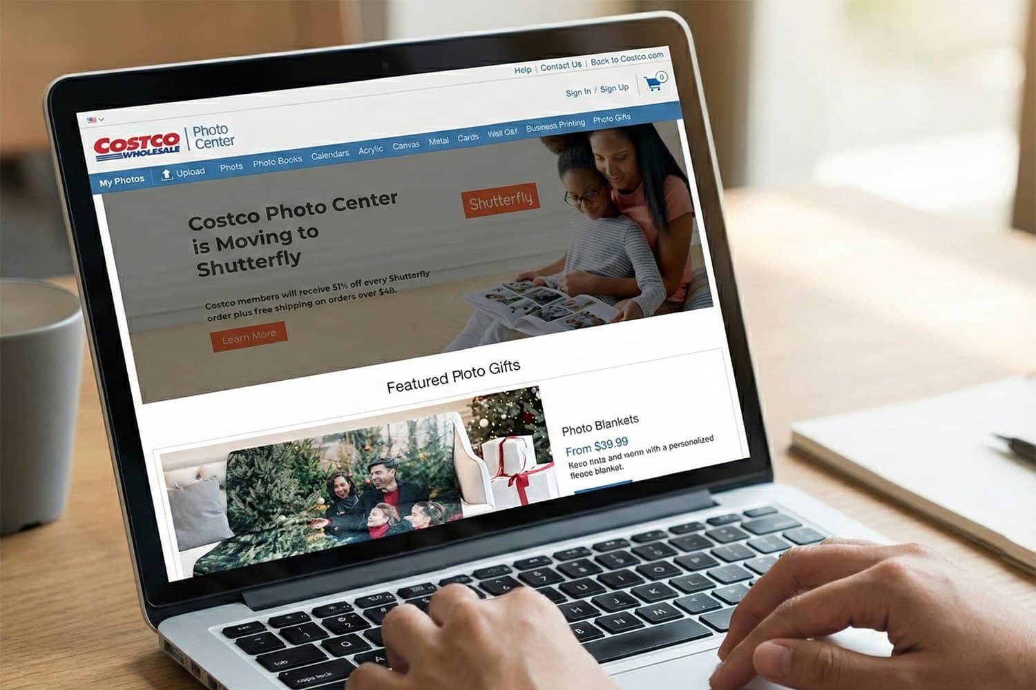 Costco YPOC Transition | Sensaria Costco Photo Center homepage on a laptop screen
