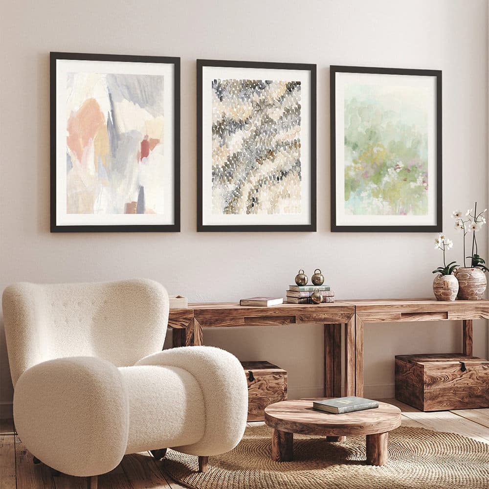 3 framed prints on wall