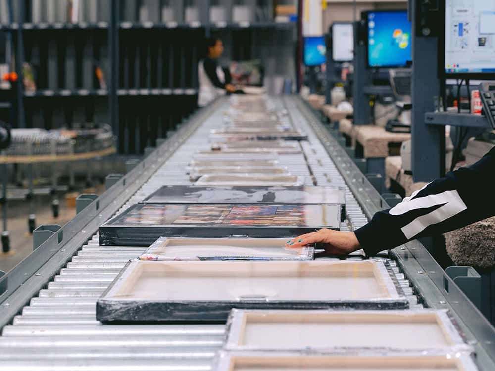 global_values_featured2 canvas prints roll down a production line